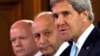 U.S. Secretary of State John Kerry (R), British Foreign Secretary William Hague (L) and French Foreign Minister Laurent Fabius attend a news conference after a meeting on Syria conflict at the Quai d'Orsay ministry in Paris, Sept. 16, 2013. 