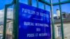 The entrance of the International Bureau of Weights and Measures is pictured in Sevres, outside Paris, Nov. 17, 2022. 