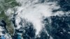 Citra satelit yang disediakan oleh National Oceanic and Atmospheric Administration menunjukkan potensi siklon tropis terbentuk di lepas pantai tenggara Amerika Serikat di Samudera Atlantik, Kamis, 21 September 2023. (NOAA via AP)
