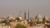 FILE - The skyline of the Iranian city of Yazd is shown in this Oct. 15, 2008, photo. Anjireh Sangi, a caravanserai near Yazd, is one of the 56 historic roadside rest stops for travelers along the country's ancient trade routes added to the United Nations World Heritage List. 