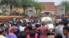 People gather outside following a blast at the Zamra convention center in Kalamassery, a town in Kochi, southern Kerala state, India, Oct.29, 2023.