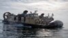 In this image provided by the U.S. Navy, sailors operate landing craft air cushions (LCAC) during recovery efforts of debris from a Chinese high altitude balloon in the Atlantic Ocean on Feb. 8, 2023. (Eric Moser/U.S. Navy via AP)