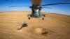 A Ukrainian military Mi-8 helicopter flies in the sky in an undisclosed location in Eastern Ukraine, Sept. 29, 2023, in a screen grab taken from video.