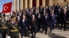 Turkey's President Recep Tayyip Erdogan, center, is seen the Republic Day ceremony at the mausoleum of modern Turkey's founder, Mustafa Kemal Ataturk, to mark the 100th anniversary of the republic's founding, in Ankara, Turkey, Oct. 29, 2023.