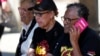 Indigenous women sit at a polling place in Redfern as Australians cast their final votes in Sydney, Oct. 14, 2023, in their first referendum that aims to tackle Indigenous disadvantage by enshrining in the constitution a new advocacy committee. 