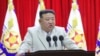 In this photo provided by the North Korean government, North Korean leader Kim Jong Un speaks during his visit to the navy headquarter in North Korea, on Aug. 27, 2023. 