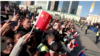 In this image taken from video, Chinese nationals wave Chinese flags at the welcome ceremony for Pope Francis in Ulaanbaatar, Mongolia, on Sept. 2, 2023.
