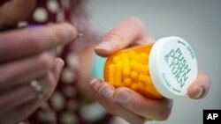 FILE - A prescription is filled Jan. 6, 2023, in Morganton, NC.