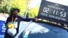 Gold medalist Ethiopia's Tigist Assefa poses next to a time board after winning the women's Berlin Marathon, Sept. 24, 2023.