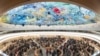 Delegates stand for a minute of silence following the deadly 6.8-magnitude Sept. 8 earthquake, in central Morocco, at the opening of the 54th UN Human Rights Council in Geneva, on Sept. 11, 2023. 