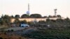 FILE - U.N. peacekeepers patrol on the Lebanese side of the Lebanese-Israeli border in the southern village of Bustan, July 12, 2023.
