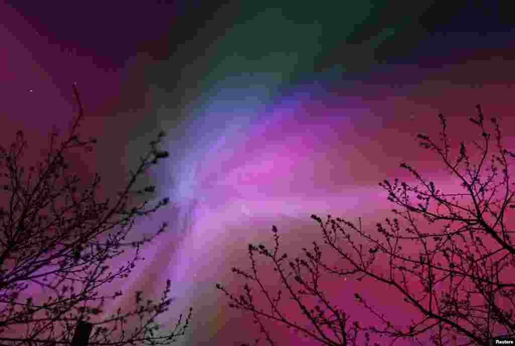 The aurora borealis illuminate the skies over the southwestern Siberian town of Tara, Omsk region, Russia, May 11, 2024. 