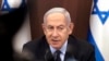 FILE - Israeli Prime Minister Benjamin Netanyahu chairs a weekly cabinet meeting at his office in Jerusalem, Aug. 27, 2023.