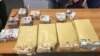 FILE - Money is seen after an investigation on drug cartels in Italy using shadow networks of Chinese money brokers to launder proceeds, in this handout photo obtained April 4, 2023. Italian police arrested 33 people on Oct. 4, 2023, in a new crackdown. (Carabinieri/via Reuters)