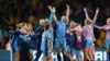 England's players react after winning the Australia and New Zealand 2023 Women's World Cup semi-final football match 