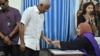 President of the Maldives Ibrahim Mohamed Solih Casts his vote at a polling station in Male, Maldives, Sept. 9, 2023. 