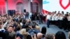 Donald Tusk, mantan perdana menteri Polandia berpidato di depan pendukungnya di markas besar partainya di Warsawa, Polandia, Minggu, 15 Oktober 2023. (AP/Petr David Josek)