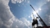 FILE - A statue of Confederate Gen. Stonewall Jackson is removed July 1, 2020, in Richmond, Va. The school board of Shenandoah County, Va., voted May 10, 2024, to rename two schools for Confederate figures four years after the names had been removed.