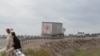 Vehicles of the International Committee of the Red Cross filled with humanitarian aid for residents of Nagorno-Karabakh drive toward the Armenia-Azerbaijan border along a road near the village of Kornidzor, Armenia, Sept. 23, 2023. 
