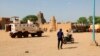 FILE - United Nations forces patrol the streets of Timbuktu, Mali, on Sept. 26, 2021. 