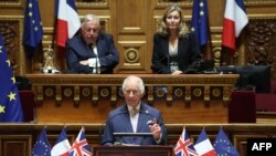 Britain's King Charles addresses Senators and members of the National Assembly at the French Senate, the first time a member of the British Royal Family has spoken from the Senate Chamber, in Paris on Sept. 21, 2023.