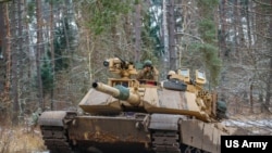 Фото для ілюстрації: військовий США на танку M1A1 Abrams під час навчань в Польщі, листопад 2022 року