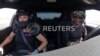 Pendiri Asosiasi Pengemudi Perempuan (AWD), Olivia Summers, sedang melatih Wakisha Malone untuk melakukan aksi stunt di Rosemond, California, 17 April 2024. (Foto: Tangkapan layar Reuters TV) 