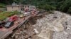In this photo released by Xinhua News Agency, an aerial photo shows the aftermath of a mudslide in Weiziping village of Luanzhen township on the outskirts of Chang'an district, Xi'an of northwestern China's Shaanxi Province, Aug. 12, 2023.