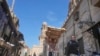 FILE - An Egyptian traditional 'Baladi' flatbread vendor rides his bicycle outside a bakery, in the Old Cairo district of Cairo, Feb. 11, 2023. Egypt’s annual inflation rate reached a record high in July, as price hikes continue. unabated. 