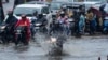 Motorists ride as it rains in Hyderabad, India, Sept. 5, 2023. Despite the September rain, India's monsoon rainfall this year was its lowest since 2018 as the El Nino weather pattern made August the driest in more than a century, according to the state-run weather department.