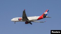 A Yemenia - Yemen Airways Airbus A330-200 descends for landing over Sanaa Airport in Sanaa, Yemen, Sept. 30, 2023.