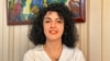 FILE — Iranian human rights activist and the vice president of the Defenders of Human Rights Center, Narges Mohammadi poses in this undated handout picture. 