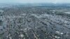 Houses are submerged in the town of Oleshky, Ukraine, June 10, 2023, from the breach of the Kakhovka Dam days earlier, on the Dnipro River in Ukraine. 
