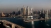 FILE - Luxury towers dominate the skyline in the Dubai Marina district in United Arab Emirates, on April 6, 2021. 