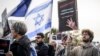 Supporters of Israel, members of the Jewish community and hostages' families and friend attend a rally calling for the release of hostages held by Hamas, near the United Nations' European headquarters in Geneva, Oct. 22, 2023.