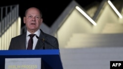 Germany's Chancellor Olaf Scholz holds a press conference during the Berlin Process Summit in Tirana, Oct. 16, 2023. 
