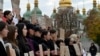 Relatives of Ukrainian Azov regiment war prisoners hold placards during a rally calling for their quick exchange with Russian prisoners of war at St. Sophia Square in Kyiv, on Oct. 18, 2023, amid the Russian invasion in Ukraine.