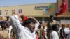 India’s leftist party activists shout slogans during a protest in front of a Bharti Walmart Best Price wholesale store in Hyderabad, India, November 19, 2102.
