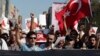 Demonstrators shout slogans during an anti-government protest in Istanbul's Kadikoy district Sept. 15, 2013.