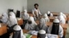 গত বছর তালিবান ক্ষমতা দখলের পরও আফগানিস্তানের রাজধানী কাবুলে খোলা থাকা এক ধর্মীয় শিক্ষাপ্রতিষ্ঠানে উপস্থিত আফগান মেয়েরা। ১১ আগস্ট, ২০২২। আফগানিস্তানের বেশিরভাগ কিশোরী এক বছর ধরে শ্রেণীকক্ষের বাইরে রয়েছে।