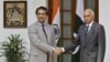 Indian Foreign Secretary Ranjan Mathai (R) shakes hands with his Pakistani counterpart Jalil Abbas Jilani during a photo opportunity in New Delhi, July 4, 2012. 
