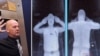 This file combination of images taken on October 13, 2009 shows an airport staff member (L) demonstrating a full body scan at Manchester Airport in Manchester, England