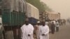 Jama'a suna tururuwa zuwa wajen bikin bude hanyar Bama, bayan da ta jima a rufe, sanadiyyar hare-haren Boko Haram
