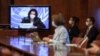 The president of the Human Rights Council, Austrian Ambassador Elisabeth Tichy-Fisslberger, is seen on a TV screen during a press conference as part of the resuming of a UN Human Rights Council session, June 15, 2020, in Geneva.