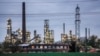 FILE - A Shell chemical plant is illuminated in Wesseling, near Cologne, Germany, on April 6, 2022.