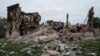 FILE - The remains of a destroyed school in which Ukrainian official say 60 people sheltering in a basement died following a Russian military strike on the village of Bilogorivka, Lugansk region, eastern Ukraine, is pictured on May 13, 2022. 