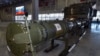 FILE - Russian Defence Ministry officials show off the Russia's 9M729 cruise missile at the military Patriot Park outside Moscow on Jan. 23, 2019.