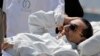Tsohon Shugaban kasar Misira Hosni Mubarak lokacin da aka kawo shi kotu a kan gadon asibiti