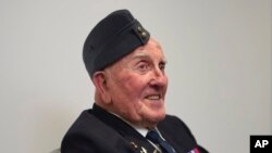 Michael Woods, 100-year-old World War II veteran, speaks during an interview in Dunstable, Bedfordshire, England, Nov. 5, 2024.