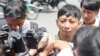 Pa Nguon Teang, the executive director of the Cambodian Center for Independent Media in front of Phnom Penh Municipal Court on Thursday, August 18, 2016. (Photo: Leng Len/VOA Khmer)